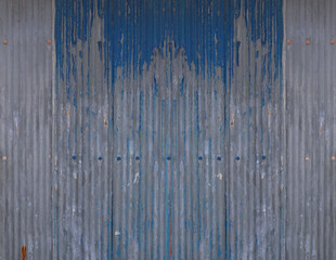 Blue old galvanized wall background.