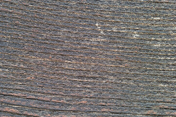 Gray board, wood texture, wooden background, damaged. Close-up, macro.