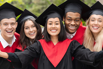 Happy multiracial group of students taking selfie, closeup