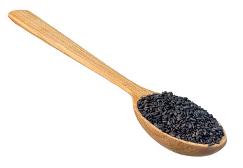 dry black sesame seeds in wooden spoon