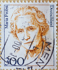 GERMANY - CIRCA 1997 : a postage stamp from Germany, showing a woman from German history the...