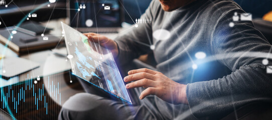Male hands with futuristic transparent digital tablet. Modern businessman working remotely. Double...