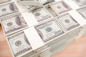 American Dollars Cash Money. One Hundred Dollar Banknotes. Stack of one hundred dollar bills .shallow focus effect.
