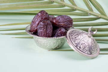 Religious Islamic festival and holy month of Ramadan, EID KAREEM, concept: A silver metallic and...
