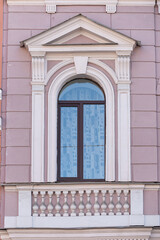 Windows on old city facades, with decorative elements