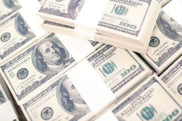 American Dollars Cash Money. One Hundred Dollar Banknotes. Stack of one hundred dollar bills .shallow focus effect.