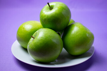 green apples on a plate