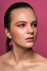 Fototapeta premium High beauty photo of a lovely young girl with wonderful professional makeup
