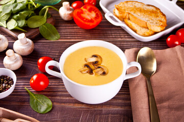 Cream of mushroom soup with sliced mushrooms.