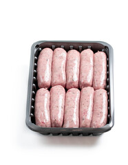 Pork sausages in plastic pack isolated on white