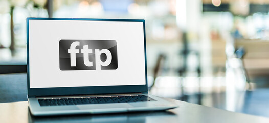 Laptop computer displaying a sign of the ftp