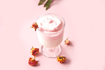Glass of rose iced Dalgona whipped drink coffee