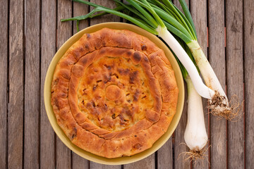 Calzone filled with onion and tuna - Traditional stuffed pizza of Puglia