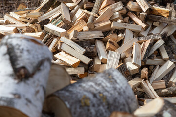 Chopped firewood stacked. wood heating season