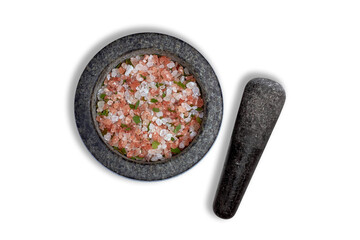 Pink salt with bay leaf in granite mortar with pestle