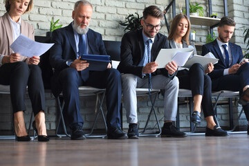 Modern business people waiting for job interview.