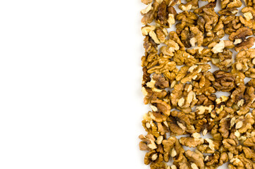 Walnuts on a white background with a place for your text. Background from dried fruits