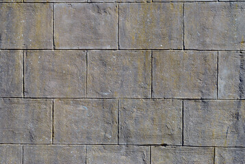 Weathered Textured Surface of Concrete Wall with Block Design