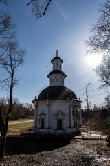 Fototapeta premium golden towers and ancient architectural solutions of the Trinity-Sergievskaya Lavra in Sergiev Posad on a sunny spring day 