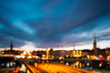 Fototapeta na wymiar Stockholm, Sweden. Night Skyline Abstract Boke Bokeh Background. Design Backdrop. Night Lighting