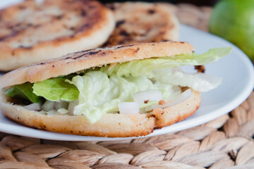 Close-up of gordita de chicharron, a big stuffed tortilla eaten in Mexico city
