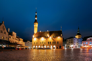Fototapeta premium Tallinn, Estonia. Famous Old Traditional Town Hall Square Evening. Famous Landmark And Popular Place. Destination Scenic