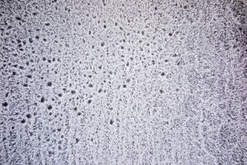 Fototapeta na wymiar frost, ice coating on the garage window pane