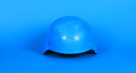 un blue helmet on blue background