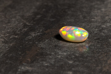 Opal gem with iridescence