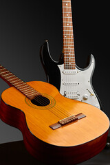 Obraz na płótnie Canvas Modern electric and retro acoustic guitars