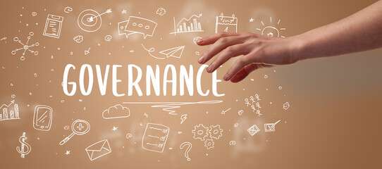 Close-Up of cropped hand pointing at business inscription