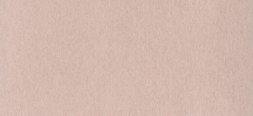Clean brown cardboard paper background texture. Horizontal banner
