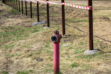 Fototapeta na wymiar red fire hydrant, firecock, Active fire protection