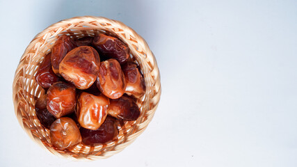 Selective Focus - sweet dried date palm fruits or kurma, ramadan (ramazan) food
