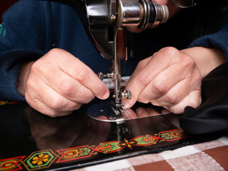 Antique Sigma hexagon sewing machine with details of its mechanical elements