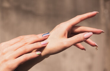 Obraz na płótnie Canvas Beautiful female hands. Skin care symbol