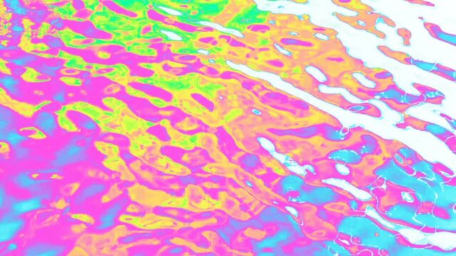Slow motion multicolored water video background.