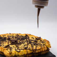 chocolate dripping on a cake