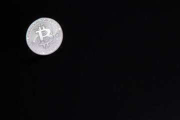 Photograph of bitcoin coins symbolizing the financial market of cryptocurrencies on a colored background and without people