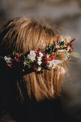 Flower crown in the hair of a blonde girl