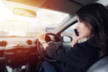 Woman Talking on phone while driving