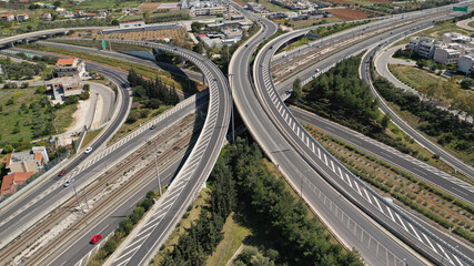 Naklejka premium Aerial drone photo of multilevel highway intersection junction toll road outside city urban center