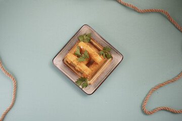 Bowl with cheese sticks. cheese sticks, breaded.
