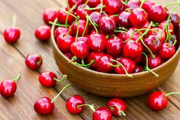 Ripe juicy berries cherries in a bowl. Freshly picked ripe cherries in a bowl