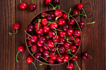 Ripe juicy berries cherries in a bowl. Freshly picked ripe cherries in a bowl