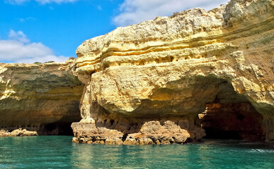 Fototapeta na wymiar Beautiful caves in turquoise water between Albufeira and Benagil cave