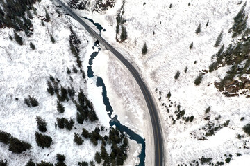 Aerial view of the Richardson Highway, Keystone Canyon, and Lowe River near Valdez, Alaska during the winter.