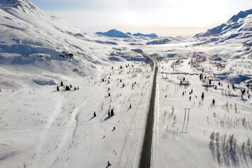 Aerial view of the Richardson Highway at Thompson Pass near Valdez, Alaska during the winter.