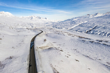 Aerial view of the Richardson Highway at Thompson Pass near Valdez, Alaska during the winter.