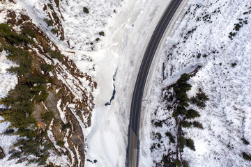Aerial view of the Richardson Highway, Keystone Canyon, and Lowe River near Valdez, Alaska during the winter.
